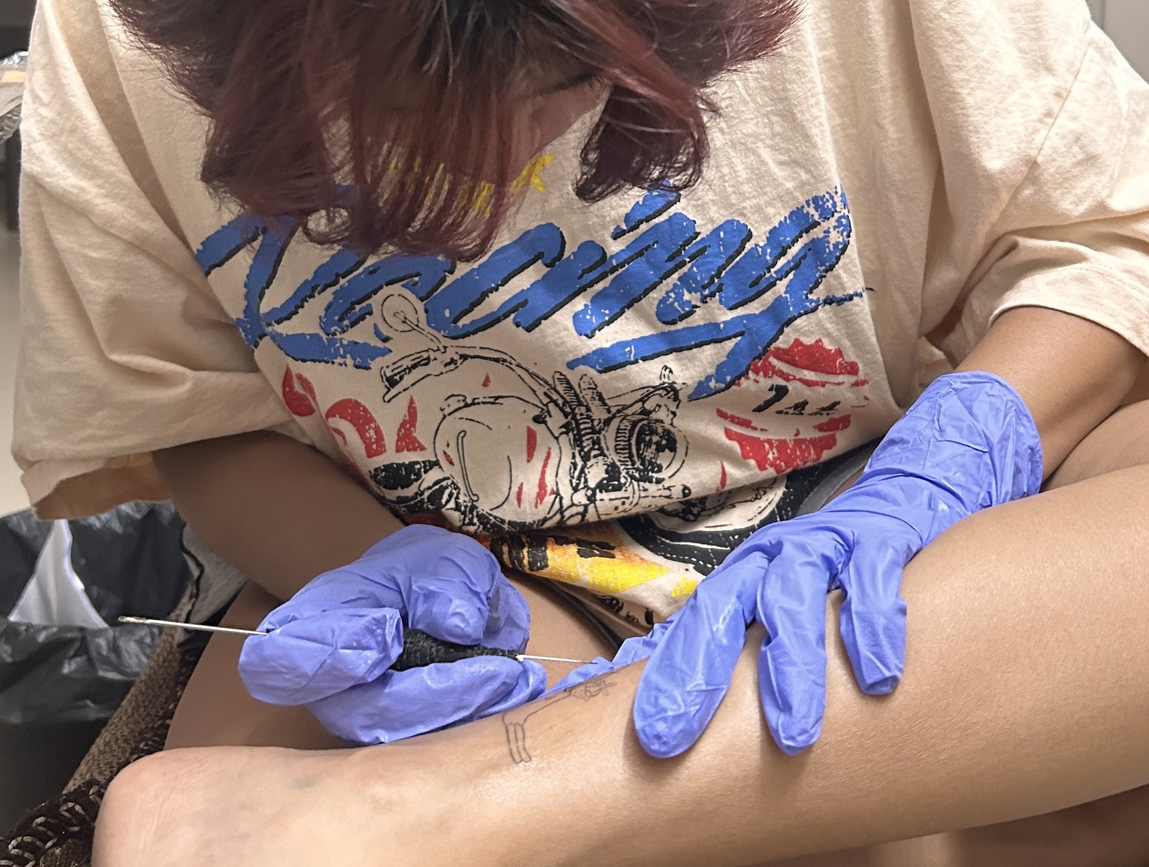 Stick and poke tattoo